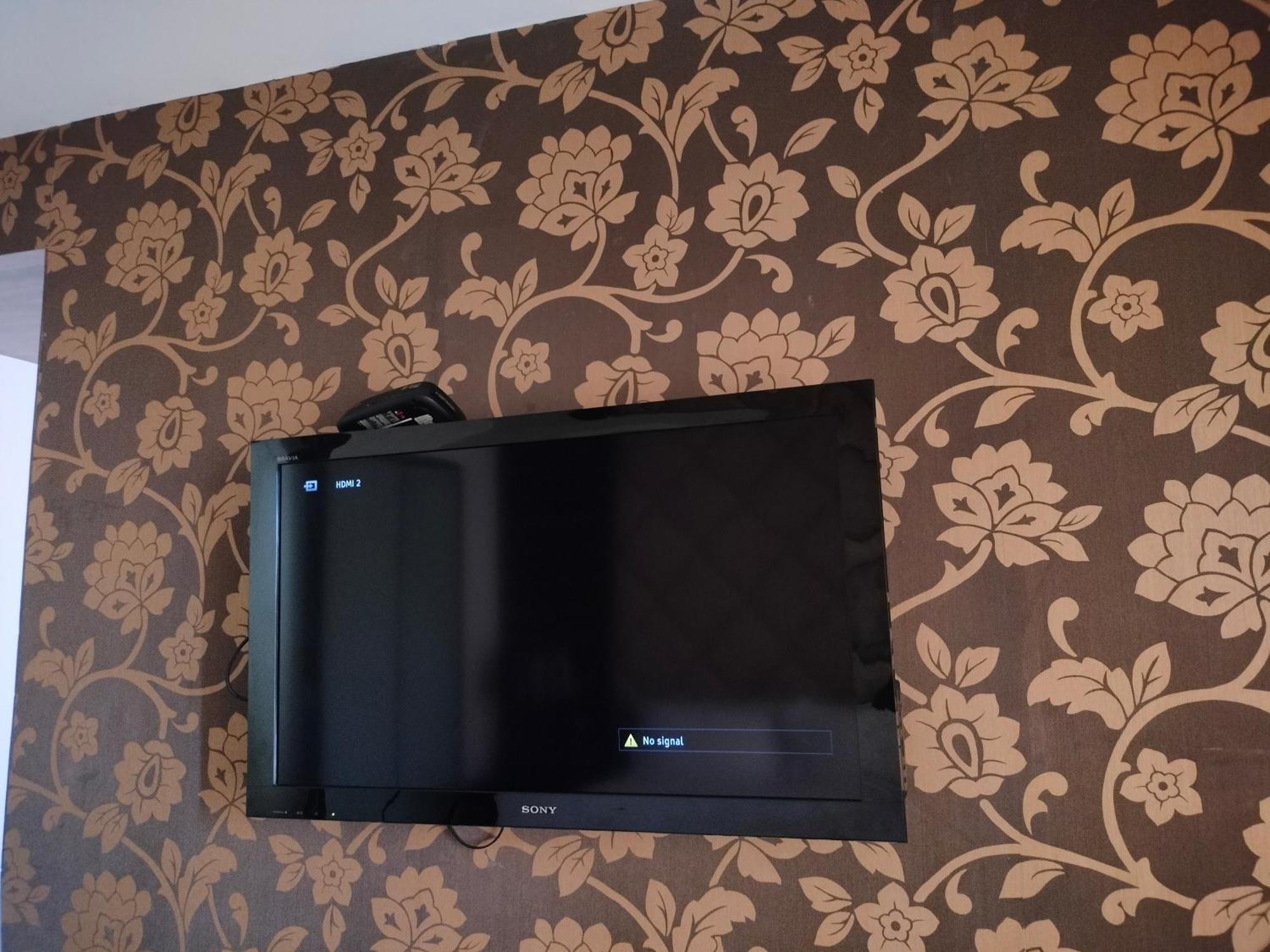 Holiday Inn Chandigarh Panchkula, An Ihg Hotel Extérieur photo A television mounted on a wall